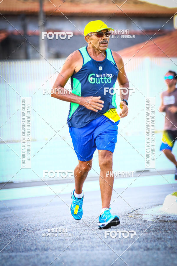 Buy your photos of the eventguia 13K Praia Grande on Fotop