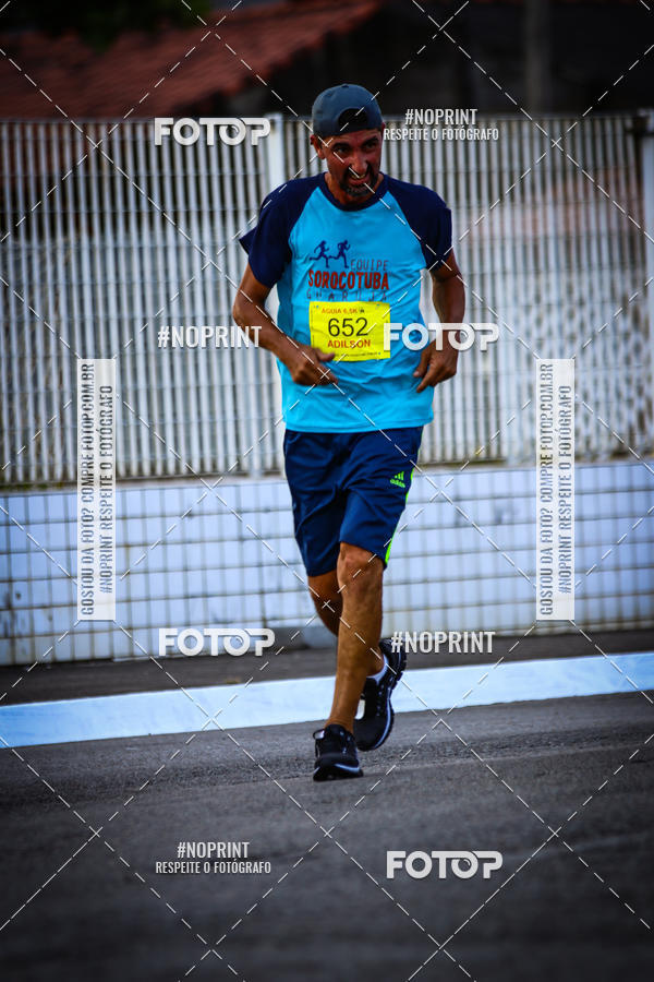 Buy your photos of the eventguia 13K Praia Grande on Fotop