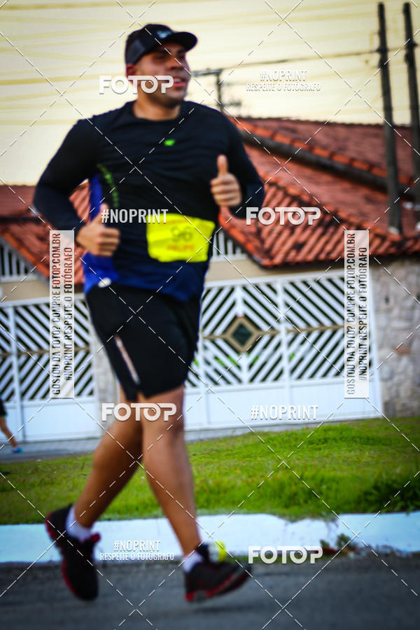 Buy your photos of the eventguia 13K Praia Grande on Fotop