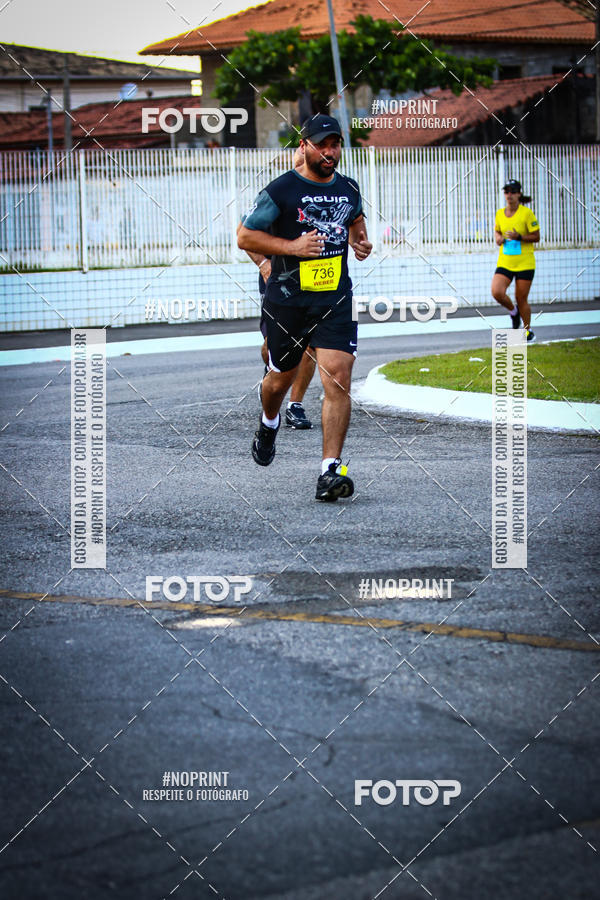 Buy your photos of the eventguia 13K Praia Grande on Fotop