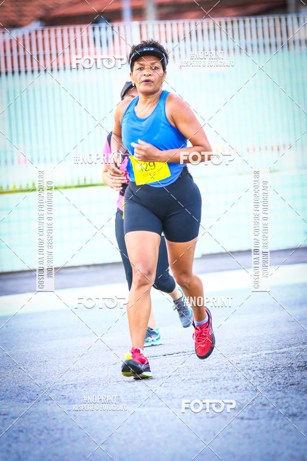 Buy your photos of the eventguia 13K Praia Grande on Fotop