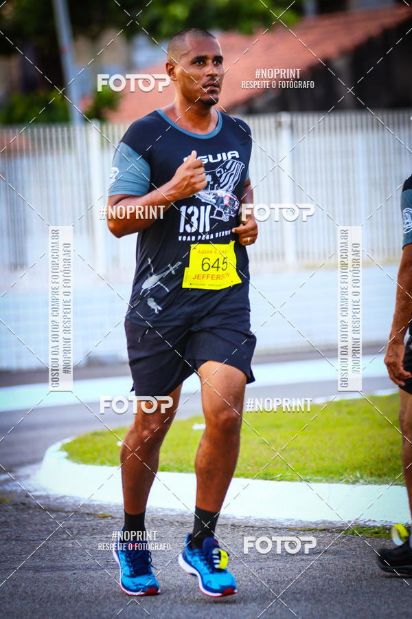 Buy your photos of the eventguia 13K Praia Grande on Fotop