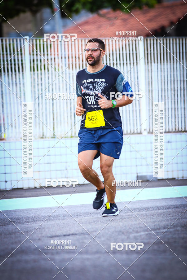 Buy your photos of the eventguia 13K Praia Grande on Fotop