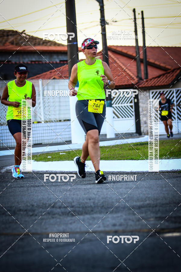 Buy your photos of the eventguia 13K Praia Grande on Fotop