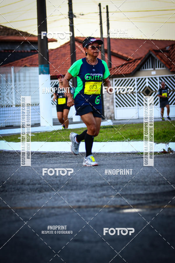Buy your photos of the eventguia 13K Praia Grande on Fotop