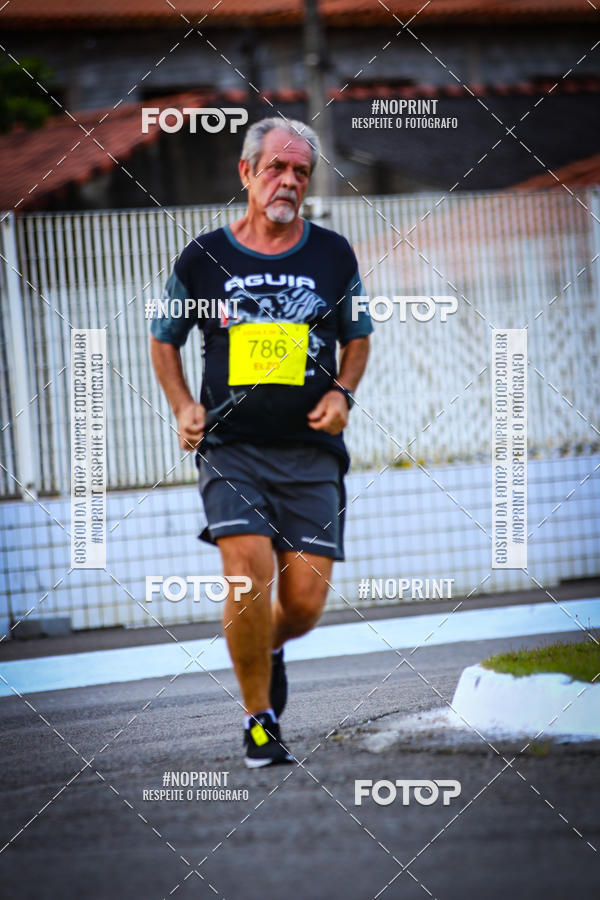 Buy your photos of the eventguia 13K Praia Grande on Fotop