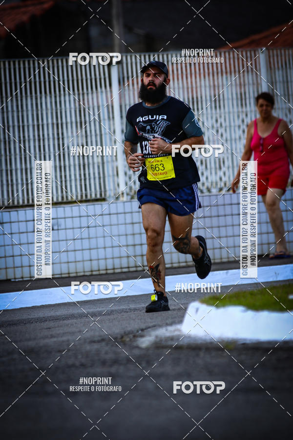 Buy your photos of the eventguia 13K Praia Grande on Fotop