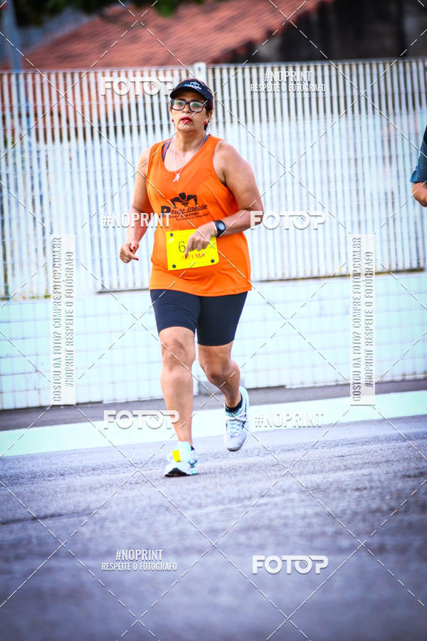 Buy your photos of the eventguia 13K Praia Grande on Fotop