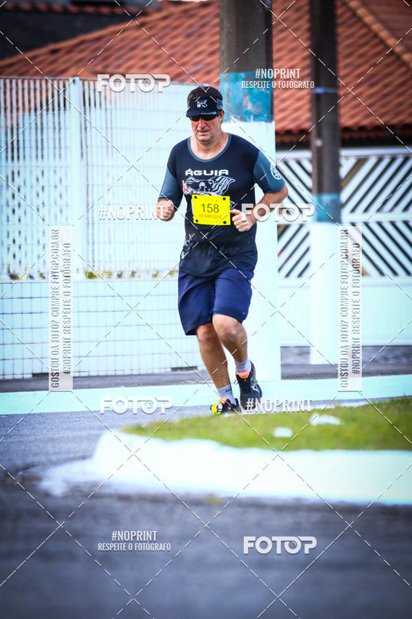 Buy your photos of the eventguia 13K Praia Grande on Fotop