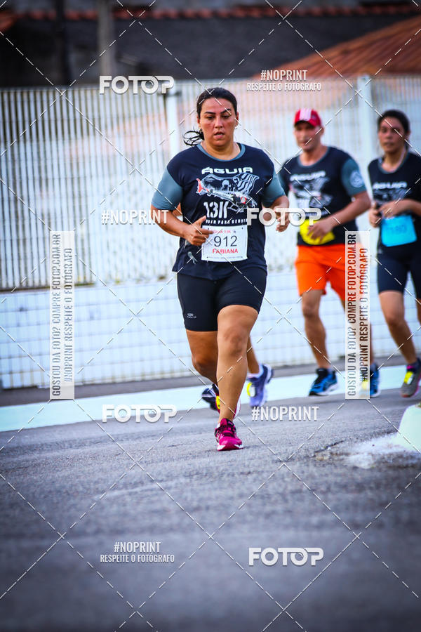 Buy your photos of the eventguia 13K Praia Grande on Fotop