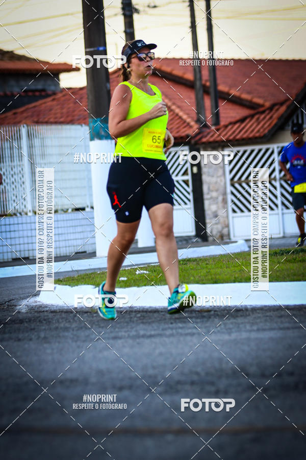 Buy your photos of the eventguia 13K Praia Grande on Fotop