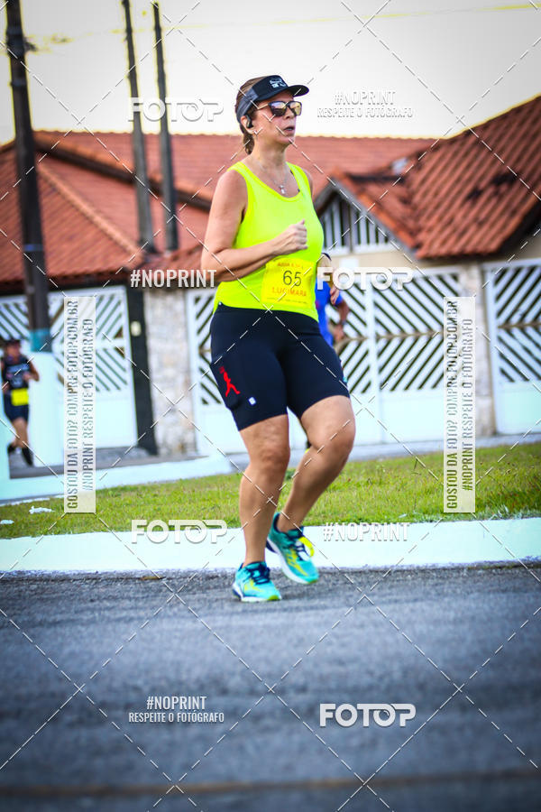 Buy your photos of the eventguia 13K Praia Grande on Fotop