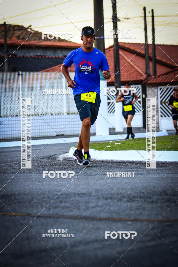 Buy your photos of the eventguia 13K Praia Grande on Fotop