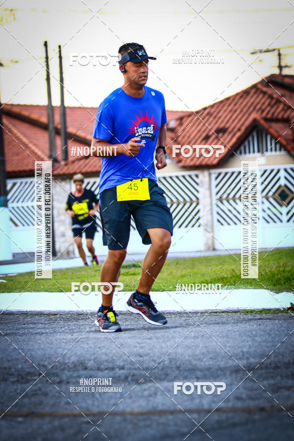 Buy your photos of the eventguia 13K Praia Grande on Fotop
