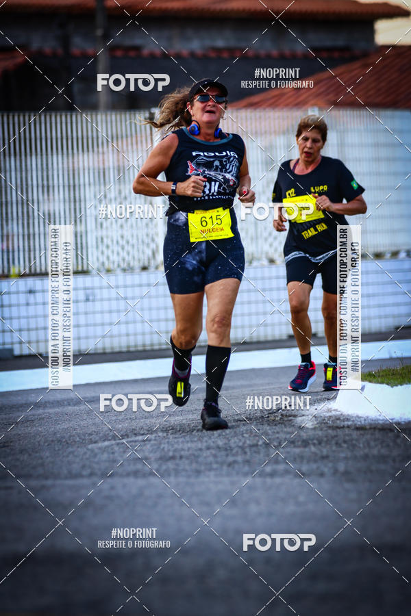 Buy your photos of the eventguia 13K Praia Grande on Fotop