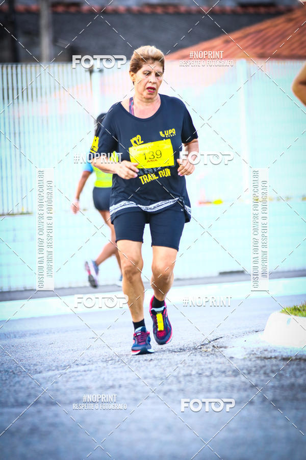 Buy your photos of the eventguia 13K Praia Grande on Fotop