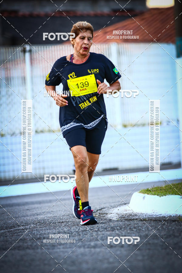 Buy your photos of the eventguia 13K Praia Grande on Fotop