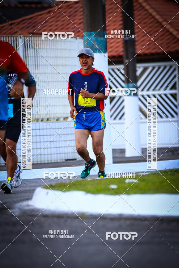 Buy your photos of the eventguia 13K Praia Grande on Fotop