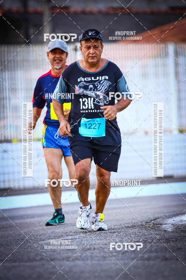 Buy your photos of the eventguia 13K Praia Grande on Fotop