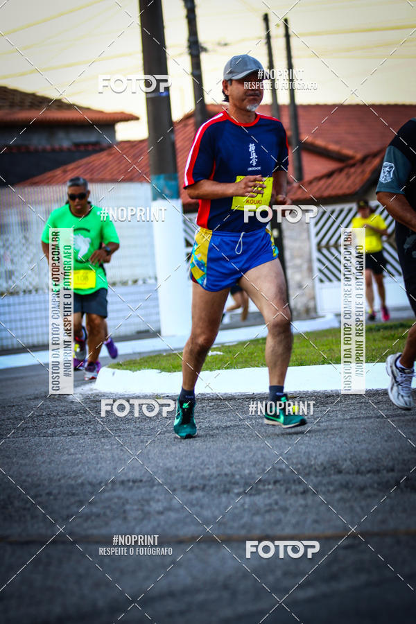 Buy your photos of the eventguia 13K Praia Grande on Fotop