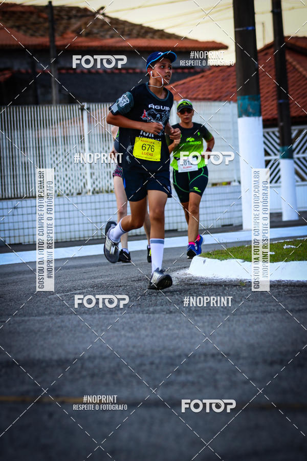Buy your photos of the eventguia 13K Praia Grande on Fotop