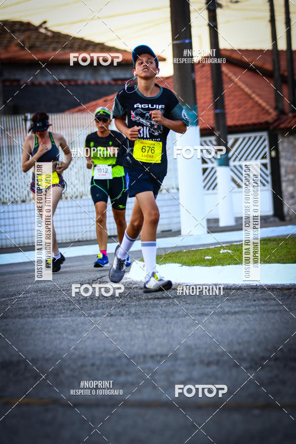 Buy your photos of the eventguia 13K Praia Grande on Fotop