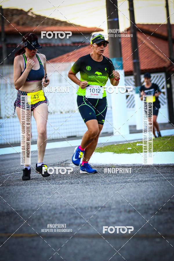 Buy your photos of the eventguia 13K Praia Grande on Fotop