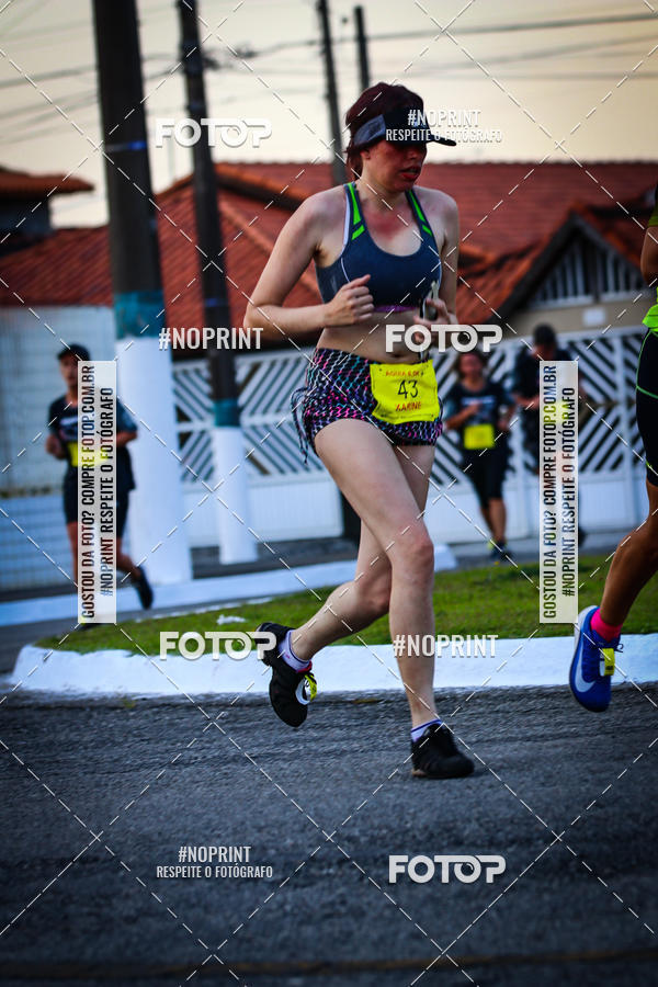 Buy your photos of the eventguia 13K Praia Grande on Fotop
