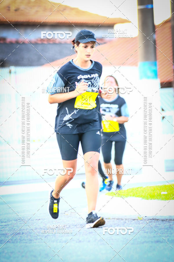 Buy your photos of the eventguia 13K Praia Grande on Fotop