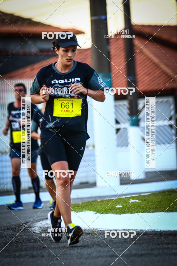 Buy your photos of the eventguia 13K Praia Grande on Fotop