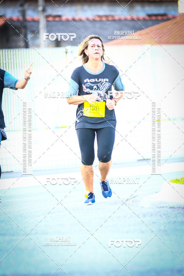 Buy your photos of the eventguia 13K Praia Grande on Fotop
