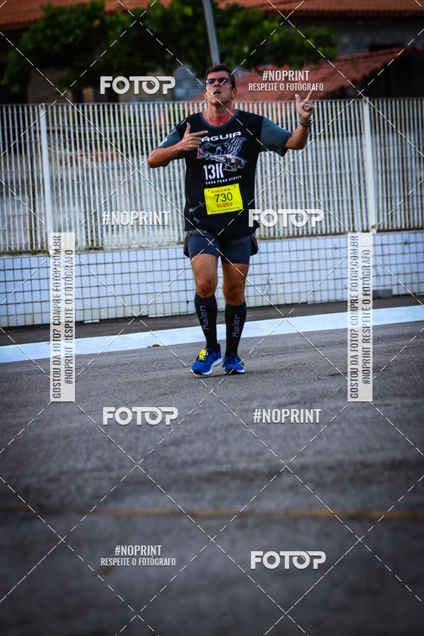 Buy your photos of the eventguia 13K Praia Grande on Fotop