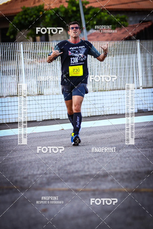 Buy your photos of the eventguia 13K Praia Grande on Fotop