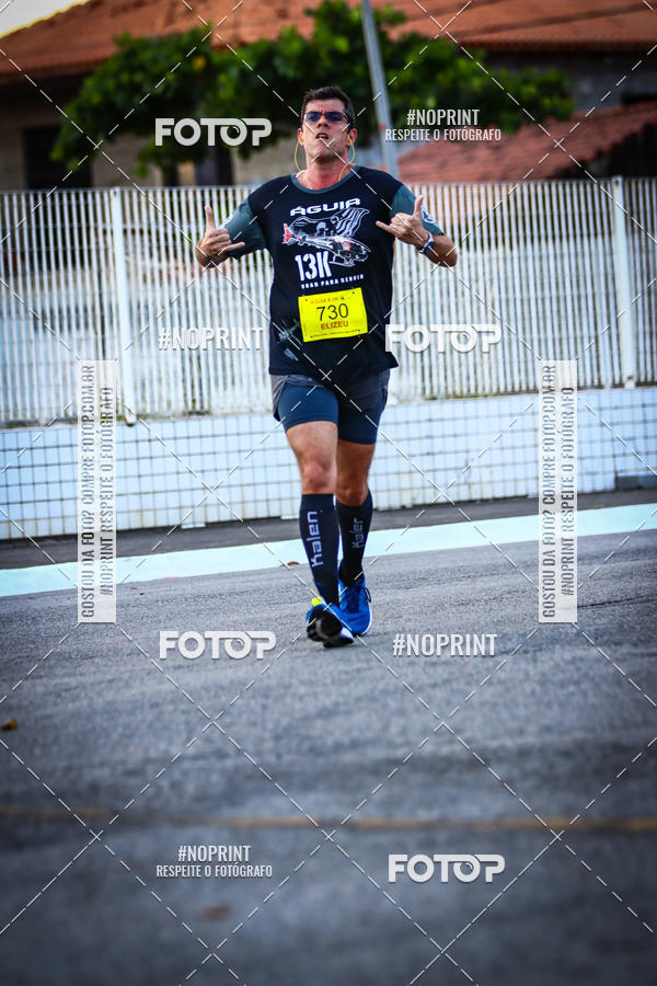 Buy your photos of the eventguia 13K Praia Grande on Fotop