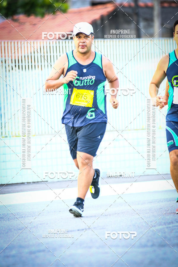 Buy your photos of the eventguia 13K Praia Grande on Fotop
