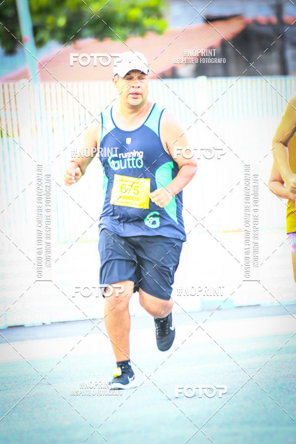 Buy your photos of the eventguia 13K Praia Grande on Fotop