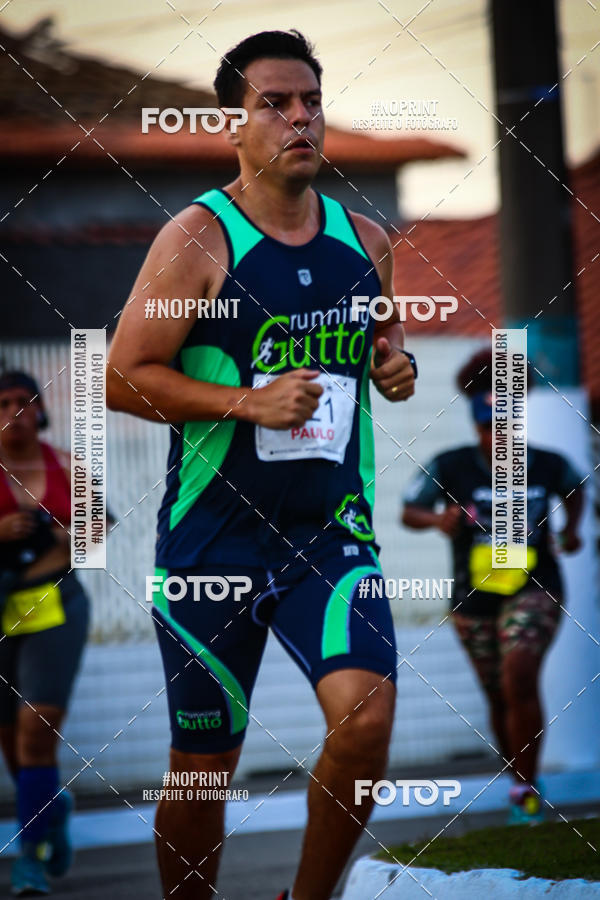 Buy your photos of the eventguia 13K Praia Grande on Fotop