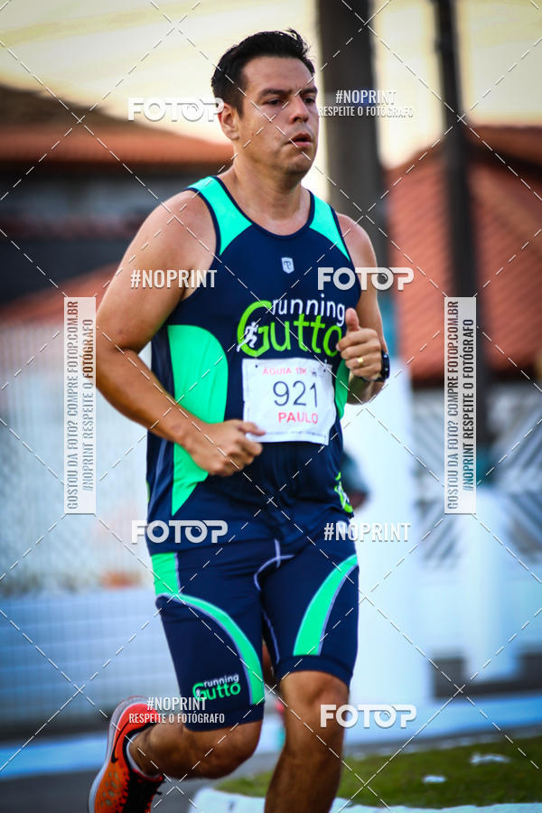 Buy your photos of the eventguia 13K Praia Grande on Fotop