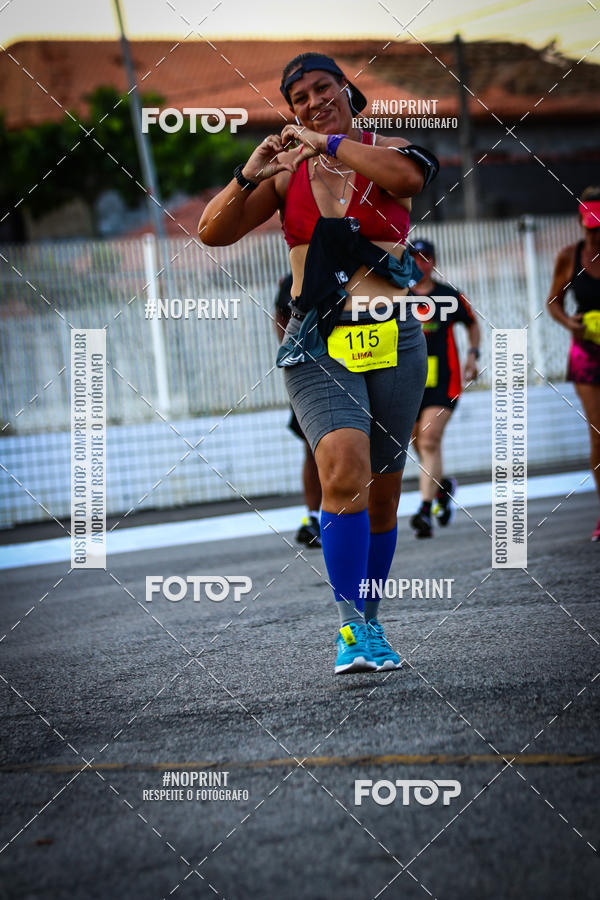 Buy your photos of the eventguia 13K Praia Grande on Fotop