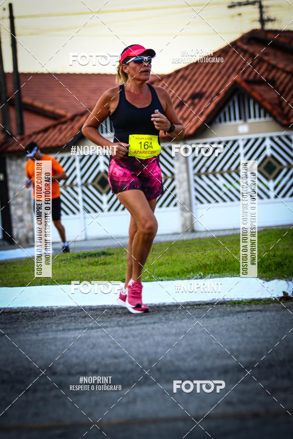 Buy your photos of the eventguia 13K Praia Grande on Fotop