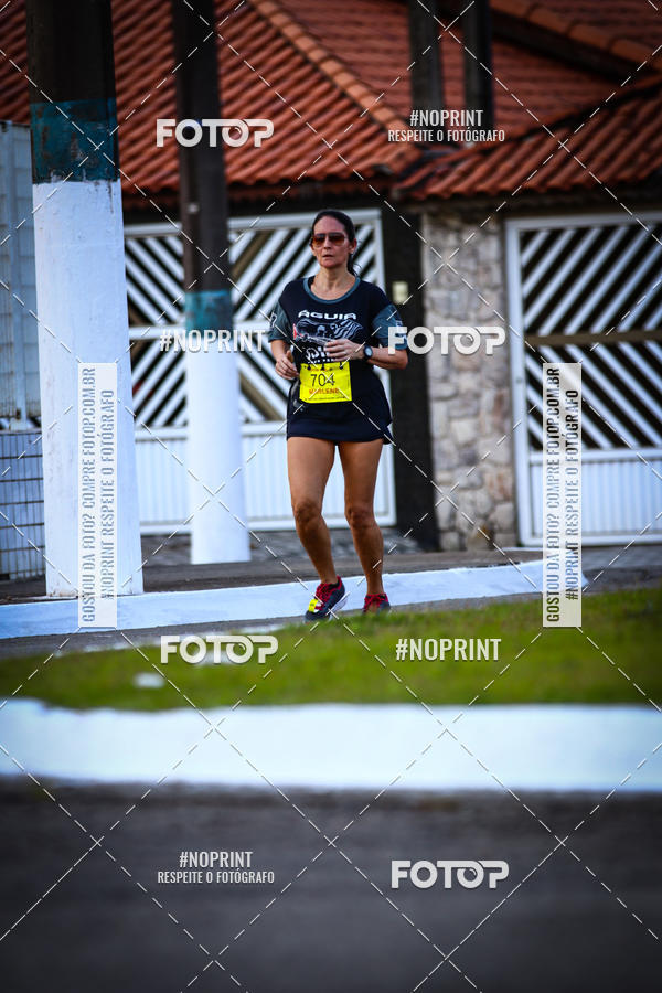 Buy your photos of the eventguia 13K Praia Grande on Fotop