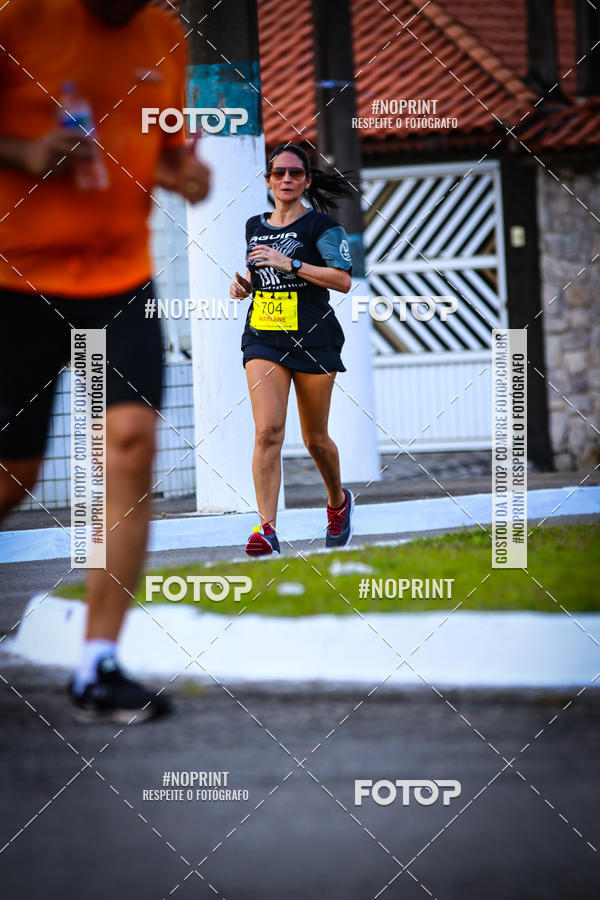 Buy your photos of the eventguia 13K Praia Grande on Fotop