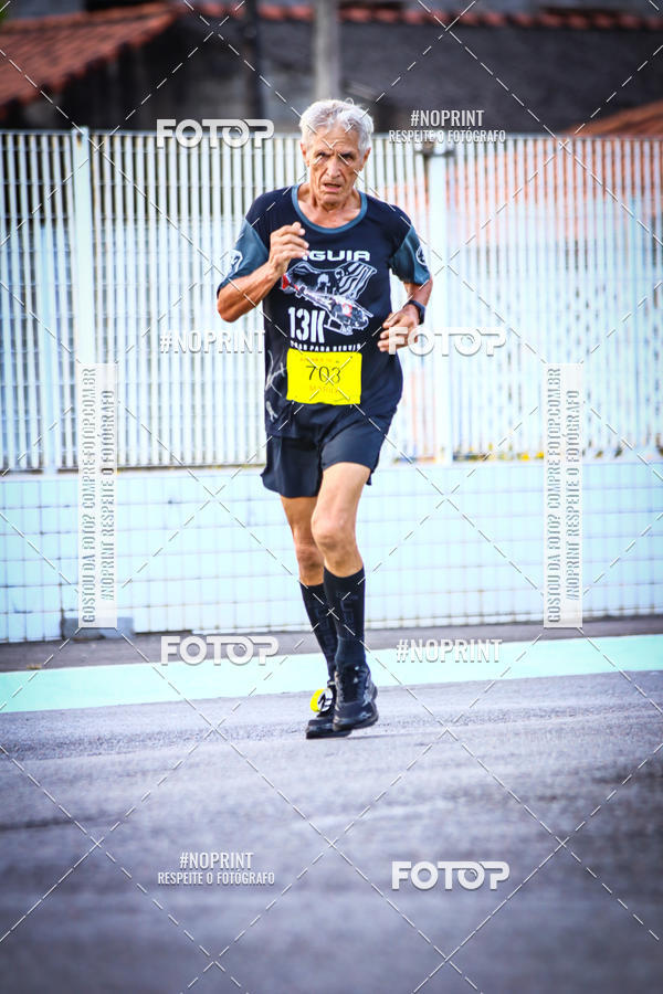 Buy your photos of the eventguia 13K Praia Grande on Fotop