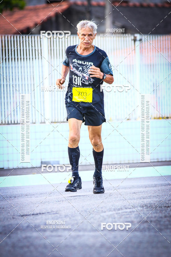 Buy your photos of the eventguia 13K Praia Grande on Fotop