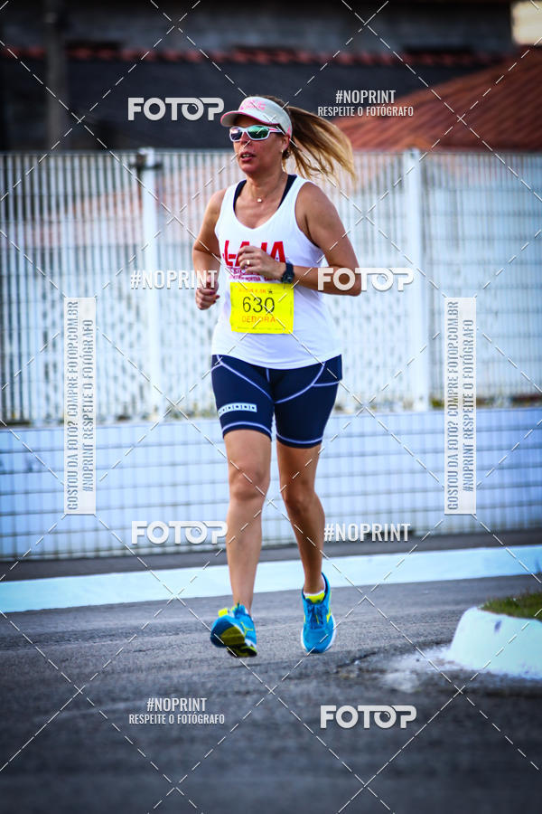 Buy your photos of the eventguia 13K Praia Grande on Fotop