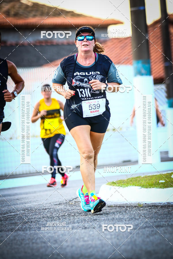 Buy your photos of the eventguia 13K Praia Grande on Fotop