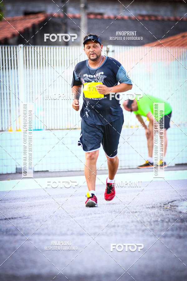 Buy your photos of the eventguia 13K Praia Grande on Fotop