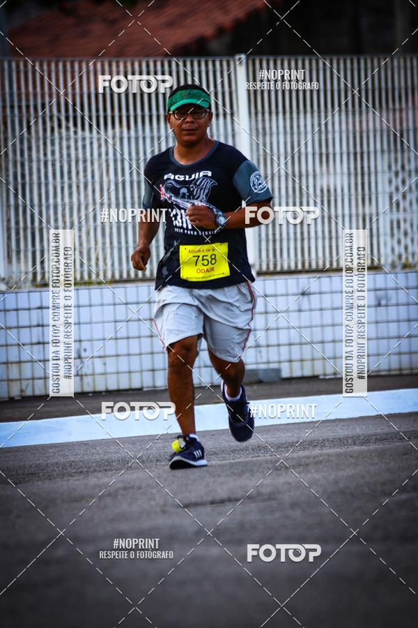 Buy your photos of the eventguia 13K Praia Grande on Fotop