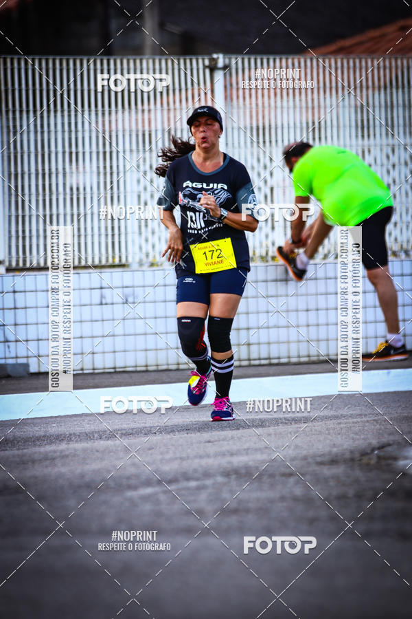 Buy your photos of the eventguia 13K Praia Grande on Fotop