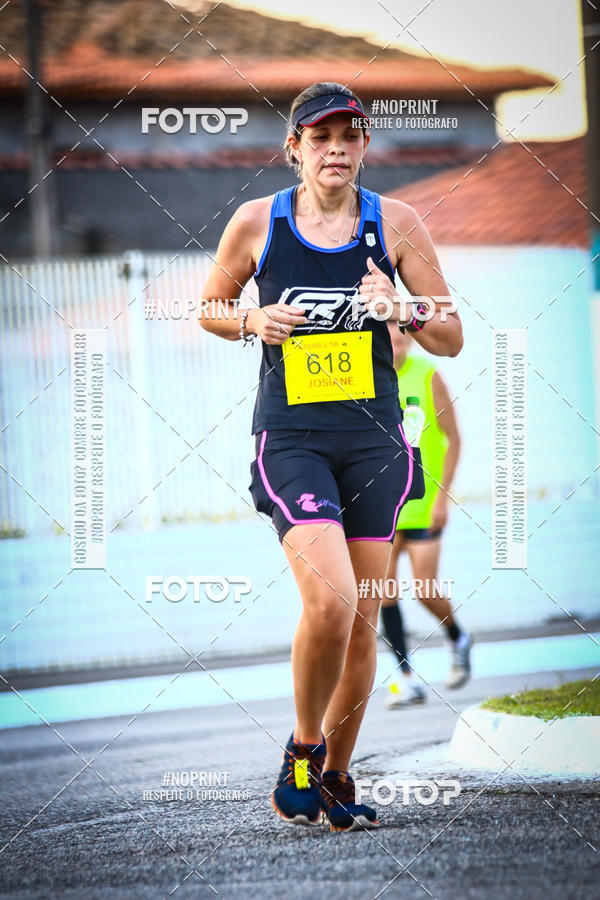 Buy your photos of the eventguia 13K Praia Grande on Fotop